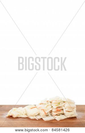 Cutted White Gimchi On A Wooden Plate