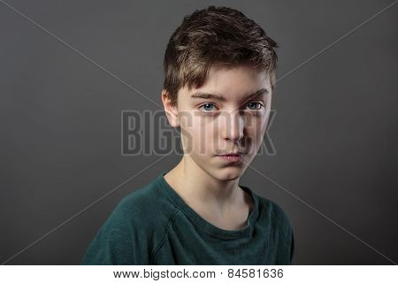 Portrait Of A Cunning Teenage Boy, With Gray Background For Fast Isolating