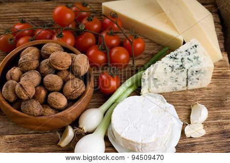Three Kinds Of Cheese And Several Kinds Of Vegetable