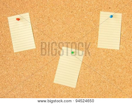 cork board three pinned note files
