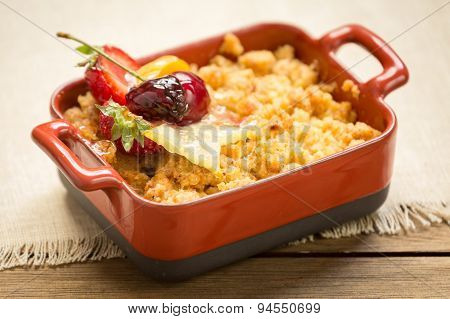 Apple Crumble On A Wooden Background