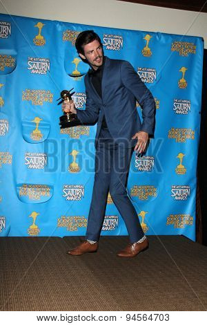 LOS ANGELES - JUN 25:  Grant Gustin at the 41st Annual Saturn Awards Press Room at the The Castaways on June 25, 2015 in Burbank, CA