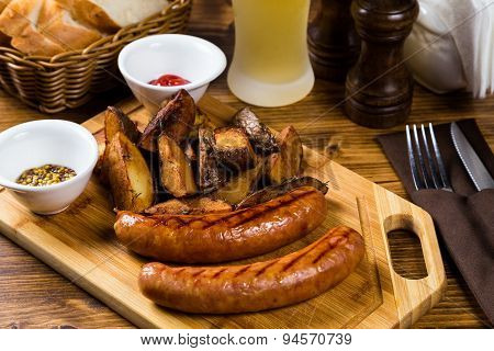 Grilled Sausages With Roast Potato With Spices
