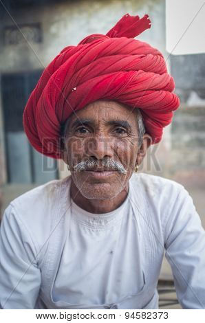 GODWAR REGION, INDIA - 12 FEBRUARY 2015: Rabari tribesman with traditional turban and clothes. Rabari or Rewari are an Indian community in the state of Gujarat.