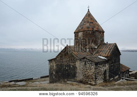 View of Surb Arakelots church in winter,Sevanavank orthodox monastery,northwestern shore of Lake Sev
