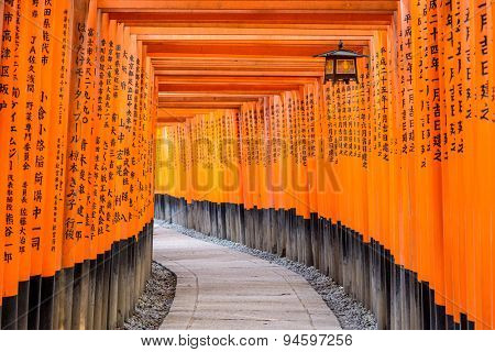 KYOTO, JAPAN - APRIL 7, 2014: Fushimi Inari Taisha Shrine torii gates in Kyoto, Japan. 