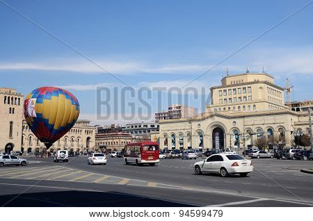People launching balloon near the Government building on Republic square,Erevan,Armenia