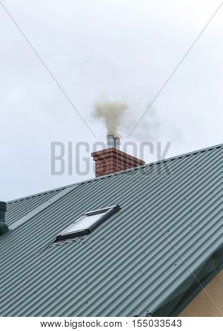House Chimney With Flying Smoke