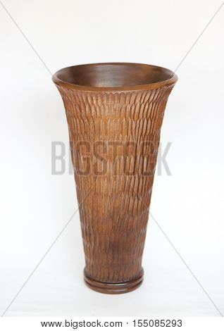 Brown wooden vase isolated on white background