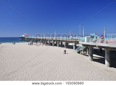 September 30 2016. Manhattan Beach California. People walking on the manhattan beach pier in Manhattan Beach California on the pacific ocean.