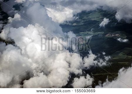 Aerial view Top cumulus clouds flying high over land