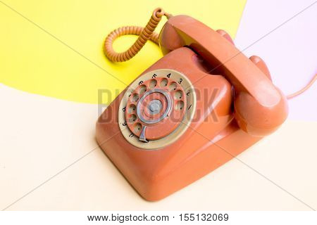 flat lay Vintage telephone on pastel color background