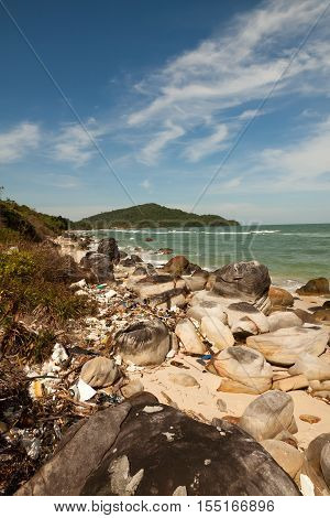 Pollution on the beach of tropical sea.