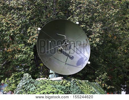 Camouflaged military object of the field radio communication complex