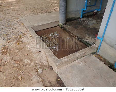 Footbath from concrete before get in the toilet