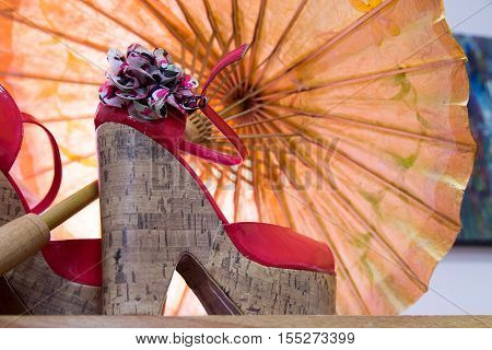fun and funky 1970s style red high heel platform shoes on display
