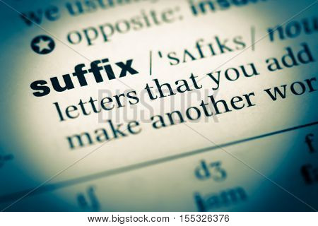 Close Up Of Old English Dictionary Page With Word Suffix