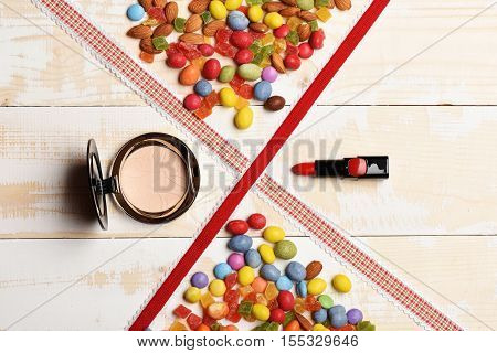 Children`s Cosmetic On Wooden Background