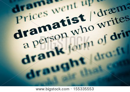Close Up Of Old English Dictionary Page With Word Dramatist