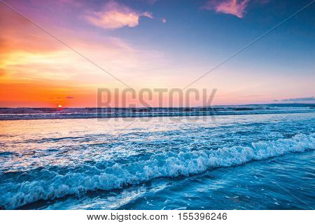 Sunset over sea on Bali, Seminyak, Double six beach