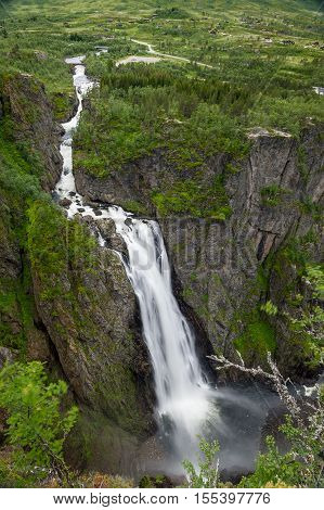 Voringsfossen waterfall close view, popular touristic attraction in Norway. Photo from viewpoint on the canyon's cliff. Hardangervidda, Norway.