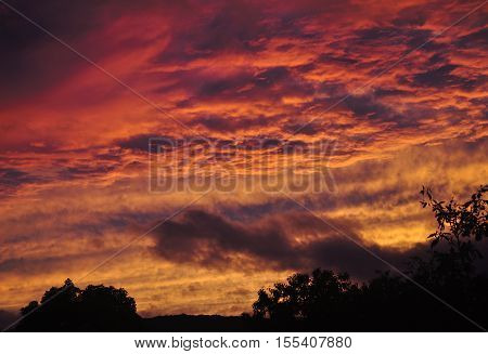 A dramatic sunset in Torrington Connecticut on an autumn evening.