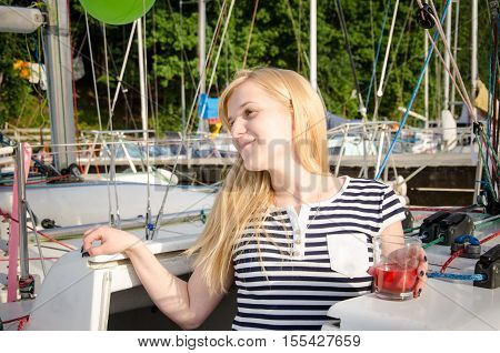 Holiday on a sailing yacht. Smiling girls on yacht. Living a happy life.
