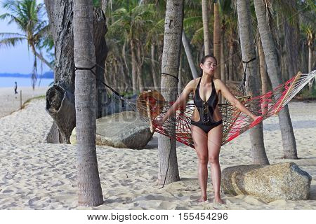 Lady relax sexy symbol in Ban Krut Beach at Prachuap Khirikhun Province Thailand