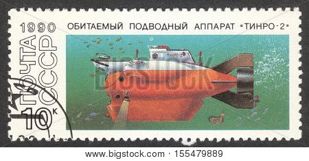 MOSCOW RUSSIA - CIRCA OCTOBER 2016: a post stamp printed in the USSR shows a TINRO-2 submarine the series "Research Submarines" circa 1990