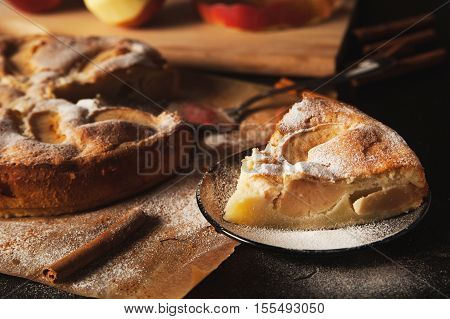 Apple pie with apples on a background