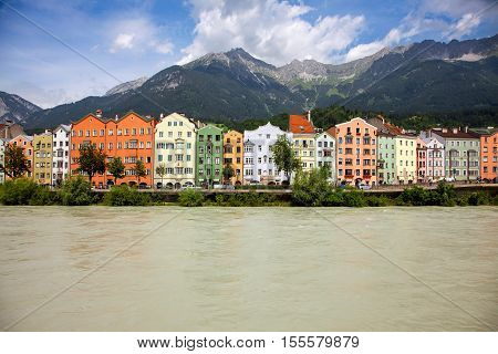 The Inn river and colorful old buildings from Innsbruck Austria