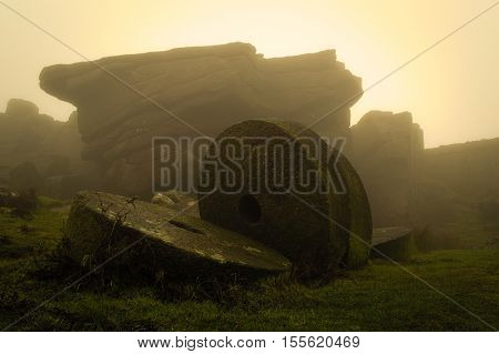Millstones in a misty sunrise, on Stannage Edge
