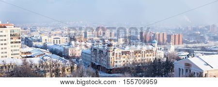 Winter panorama of the Penza city with residential areas and highway in a calm cold sunny day a top view in Penza Russia