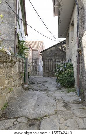 Stone alley in Combarro a village of the province of Pontevedra in the Galicia region of Spain.