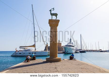 Ancient columns in the port of Rhodes. Greece