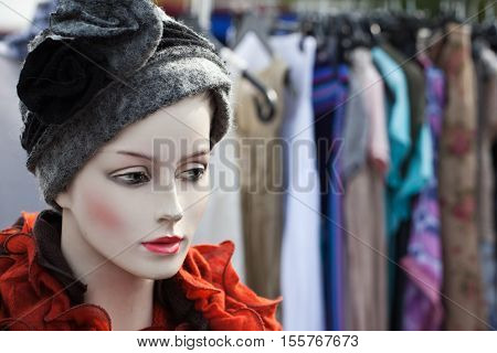 Puppet on flea market with hat on