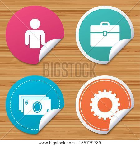 Round stickers or website banners. Businessman icons. Human silhouette and cash money signs. Case and gear symbols. Circle badges with bended corner. Vector