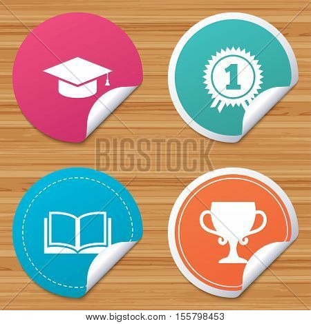 Round stickers or website banners. Graduation icons. Graduation student cap sign. Education book symbol. First place award. Winners cup. Circle badges with bended corner. Vector