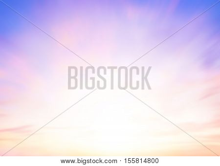 Colorful pink blur glowing and blue sky sunset. Orange and purple gradient. Sunbeam summer rays light sandy