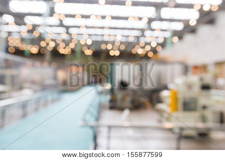 Abstract Blurred Background Interior Of Car Production Factory By Machine And Robot Automaton.