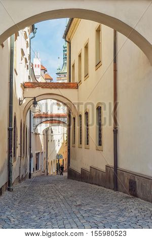 Narrow street with archway in the old town of Olomouc Czech Republic