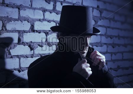 Victorian Man In The Black Coat, Top Hat And In A Tie