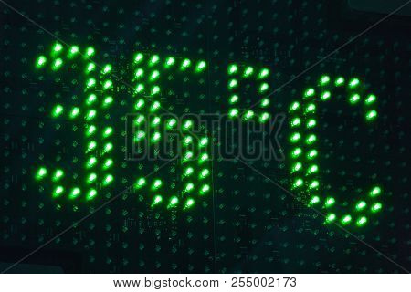 Outdoor Thermomether Display With Green Lights. Hot Summer. 35 Celsius