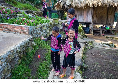 Chiang Mai, Thailand - February 18, 2017 -  An Akha Family Pose For Tourist Photos At Doi Pui Mong H