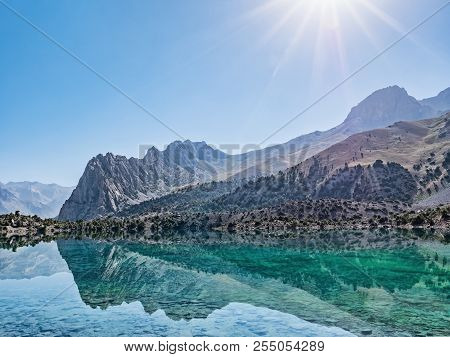 Alaudin Lake With Turquoise Water On A Rocky Mountain Background. Fann Mountains,tajikistan, Central