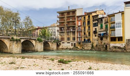 Colorful Houses And Bridge At The Ega River In Estella, Spain