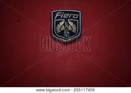 Belgrade, Serbia - August 21, 2018:  Close Up On The Rusted Fiero Logo On An Old Red Pontiac Fiero G