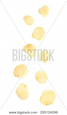 Potato Chips Falling Isolated On White Background.