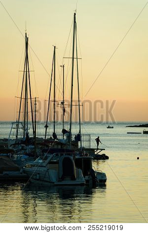 Boats At Marina In Adriatic Sea In Pula, Croatia. At Sunset