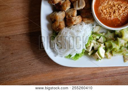 Minced Pork Sausage, Fermented Rice Noodle & Vegetable Served With Chili Sauce. Vietnamese Food Call